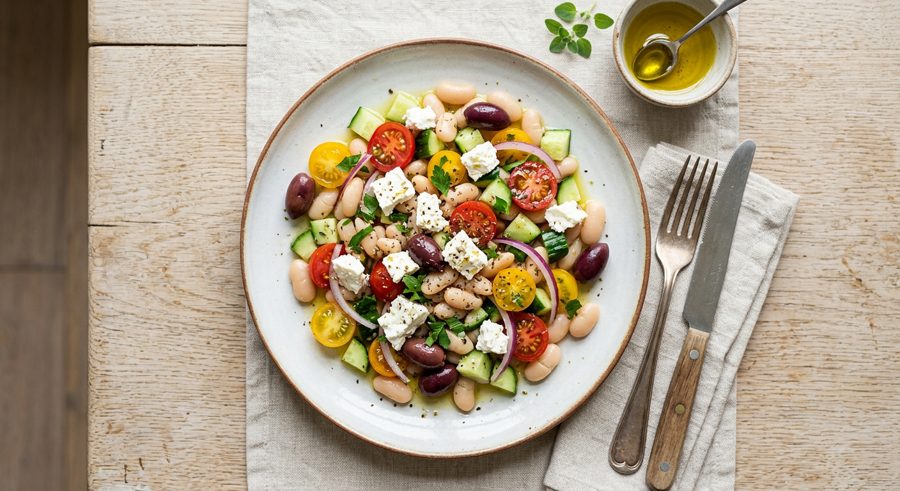 Greek Salad with White Beans served and ready to eat